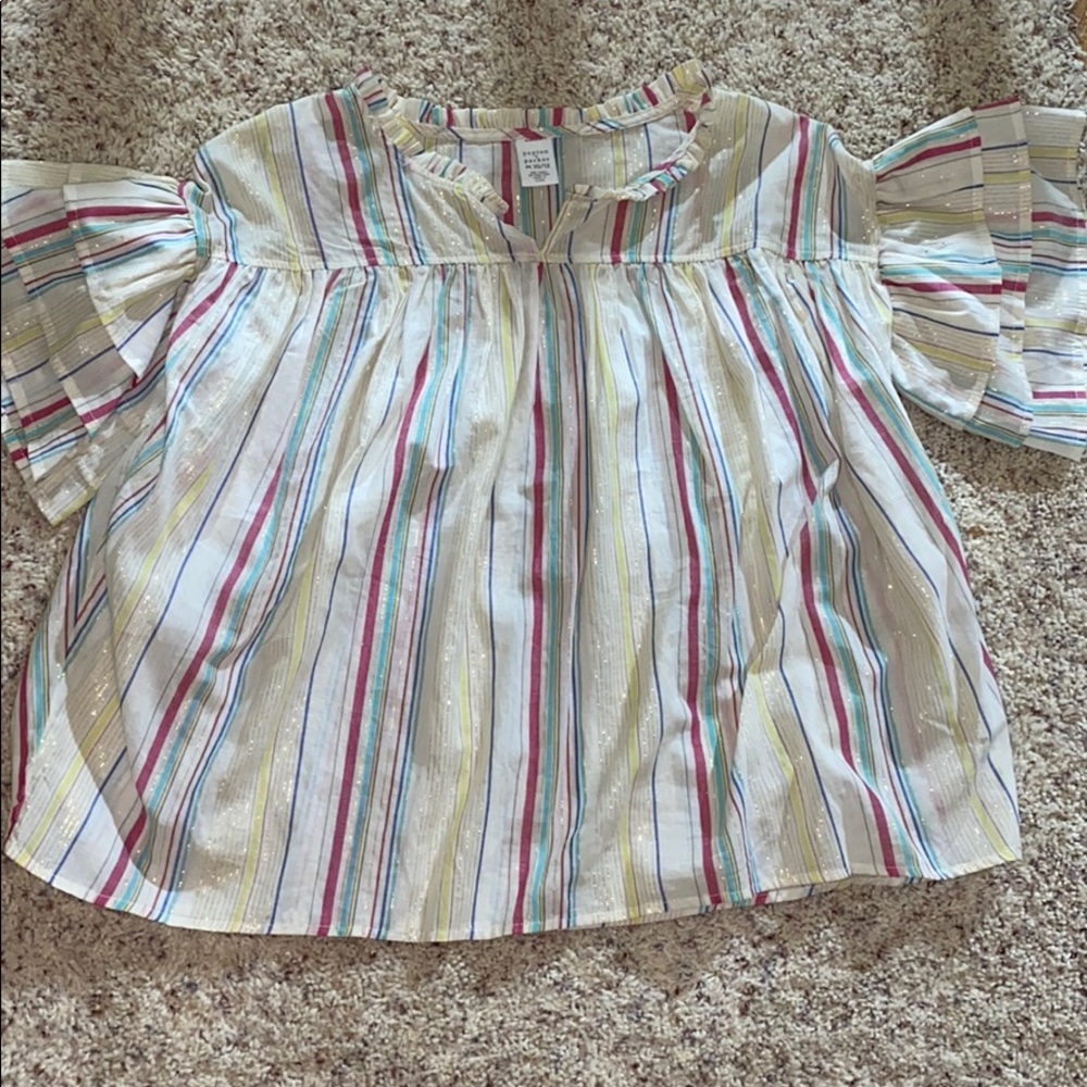 This is a loose fit shirt that is super cute!!